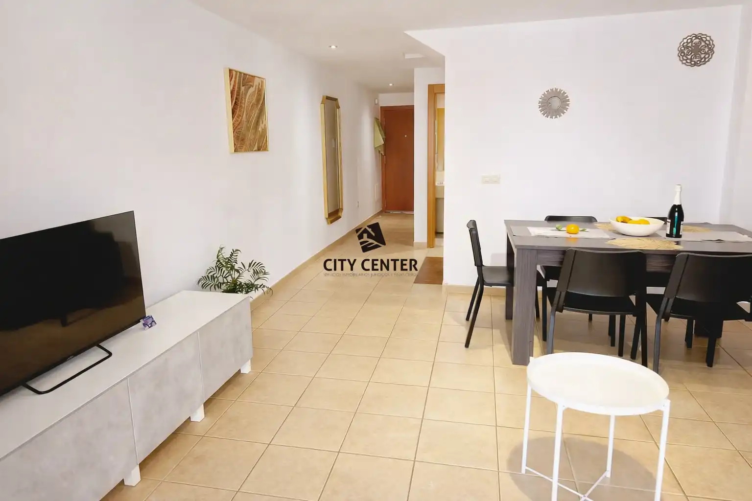 Sala d'estar de Casa adosada en venda en Adeje amb Aire condicionat, Terrassa i Traster