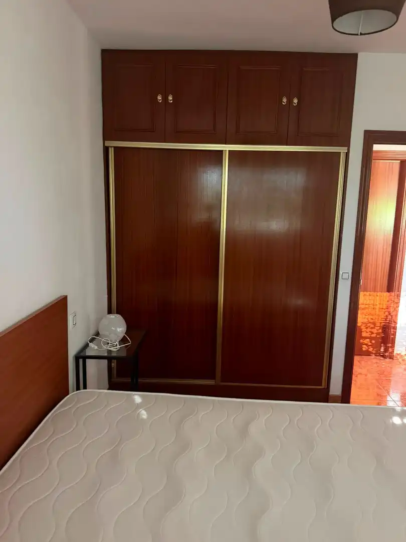 Schlafzimmer von Wohnungen zur Miete in Cáceres mit Klimaanlage, Heizung und Möbliert