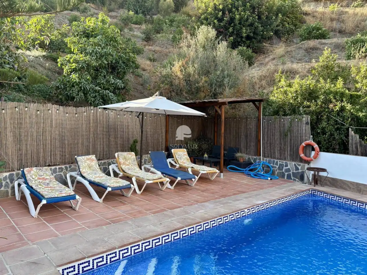 Piscina de Casa o chalet de alquiler en Canillas de Aceituno con Aire acondicionado, Calefacción y Jardín privado