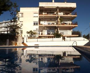 Swimming pool of Planta baja for sale in Calafell  with Air Conditioner, Heating and Private garden