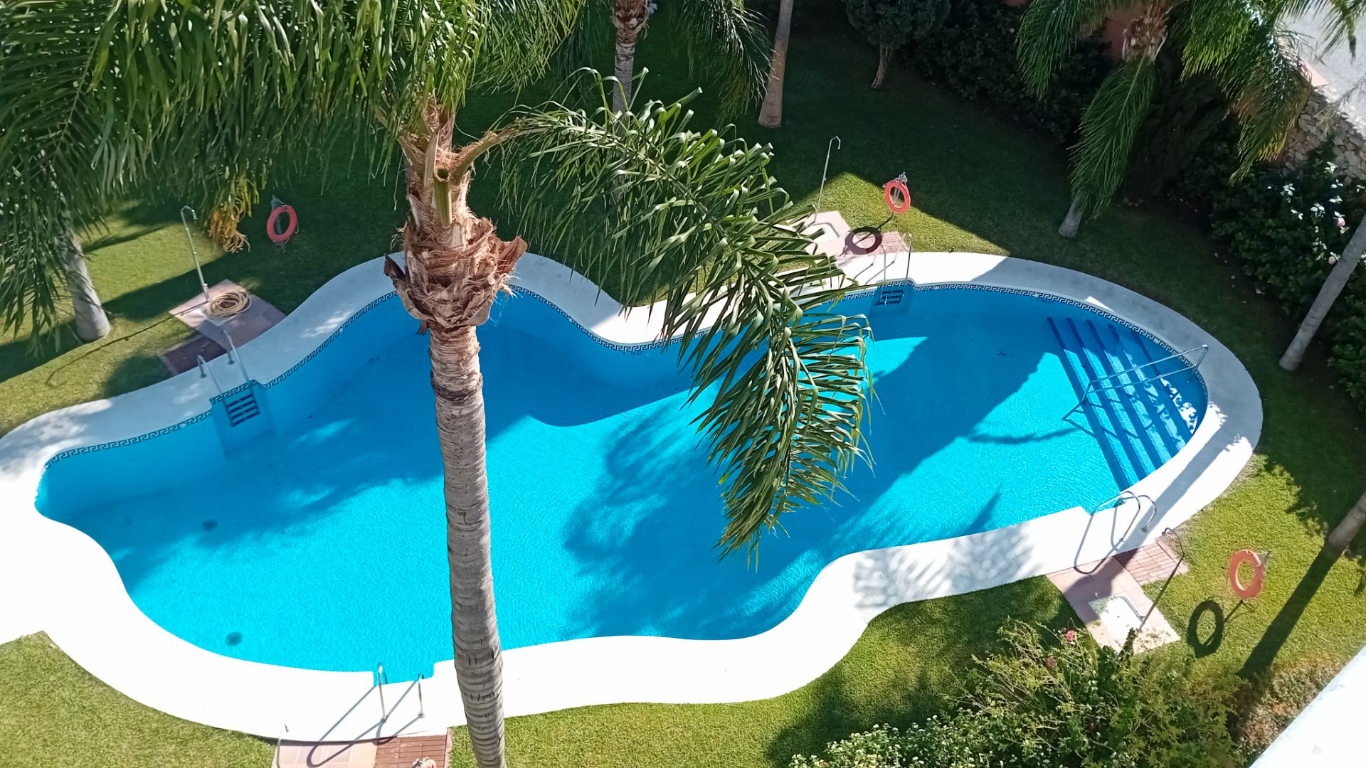 Swimming pool of Flat for sale in Almuñécar  with Air Conditioner, Terrace and Storage room