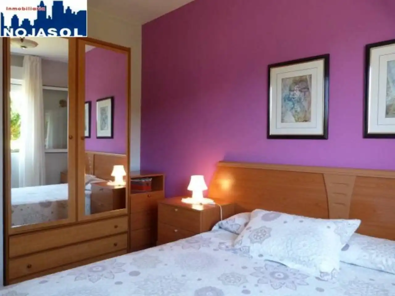 Dormitori de Apartament de lloguer en Arnuero amb Calefacció, Jardí privat i Terrassa