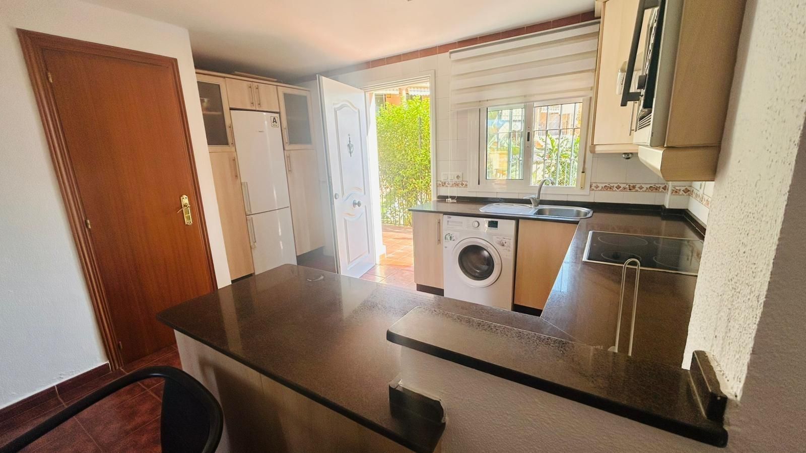 Cocina de Casa adosada en venta en Chiclana de la Frontera con Terraza, Balcón y Piscina comunitaria