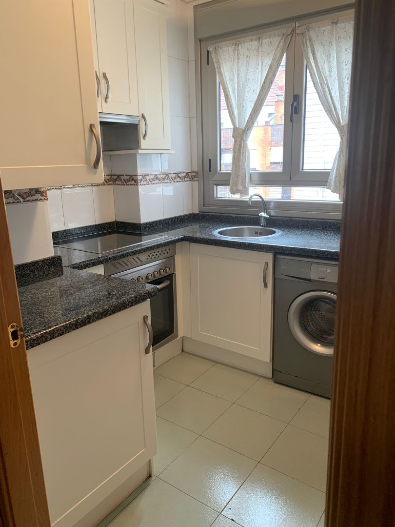 Kitchen of Apartment for sale in Oviedo   with Heating, Parquet flooring and Storage room
