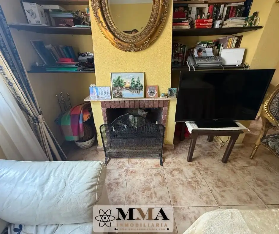 Sala d'estar de Casa adosada en venda en Aljaraque amb Calefacció