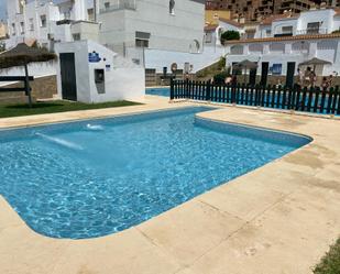 Swimming pool of Single-family semi-detached for sale in Roquetas de Mar  with Air Conditioner, Heating and Terrace