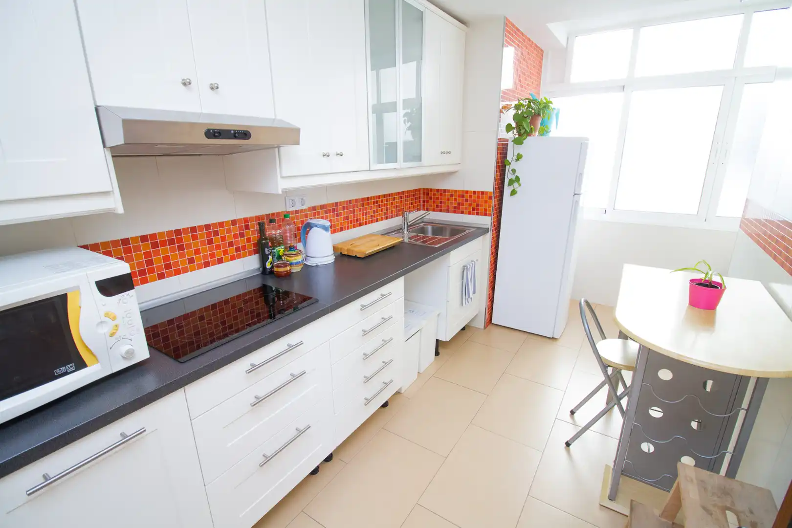 Kitchen of Flat for share in Málaga  with Air Conditioner, Heating and Furnished
