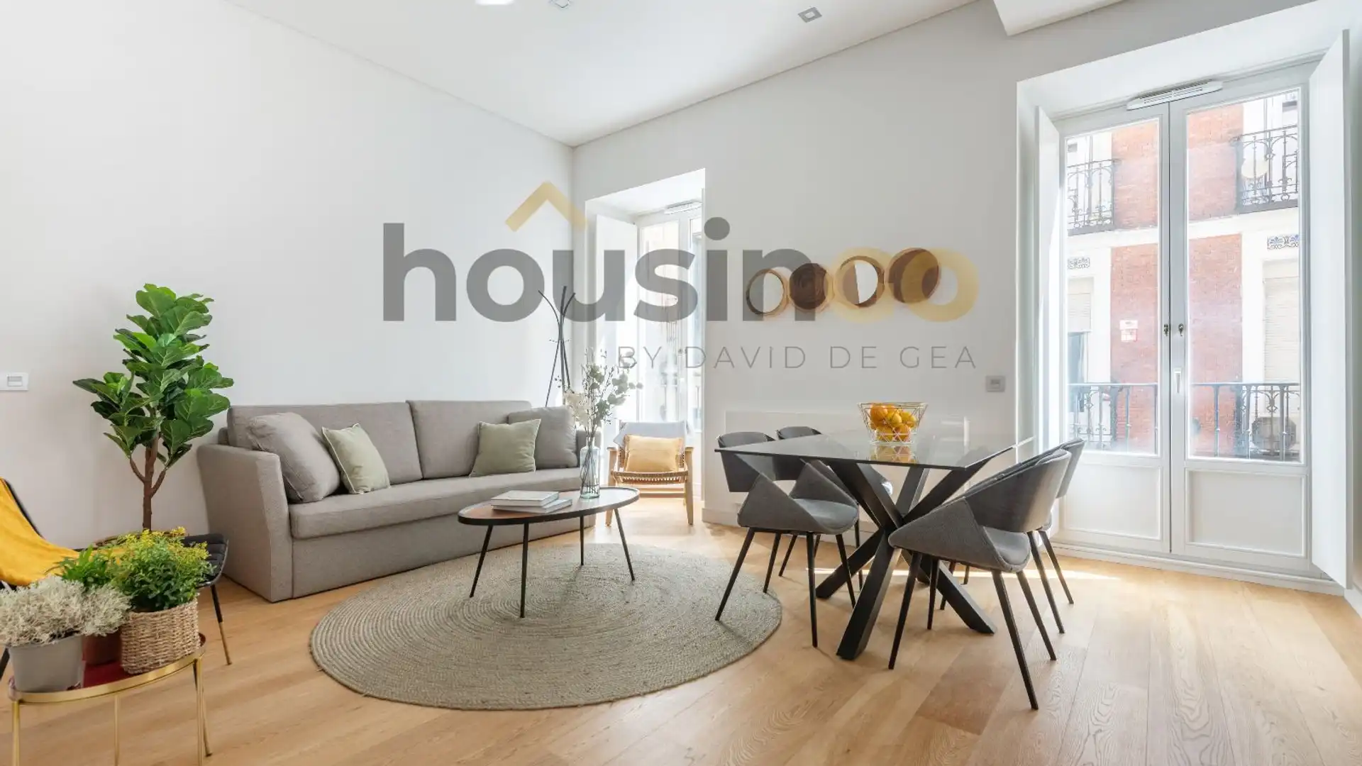 Sala d'estar de Estudi de lloguer en  Madrid Capital amb Aire condicionat, Terrassa i Moblat