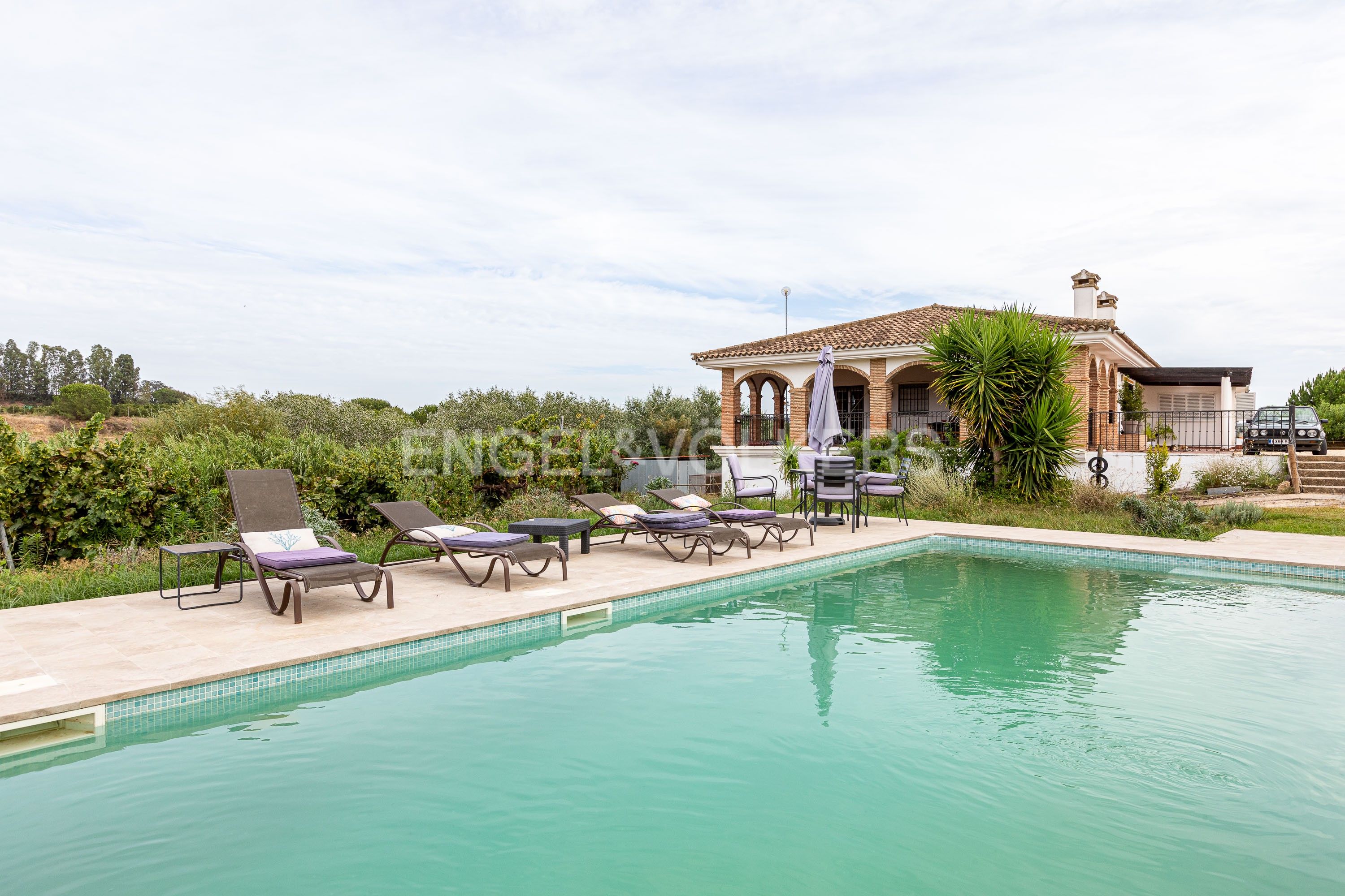 Vista exterior de Casa o xalet en venda en Cartaya amb Calefacció, Jardí privat i Terrassa