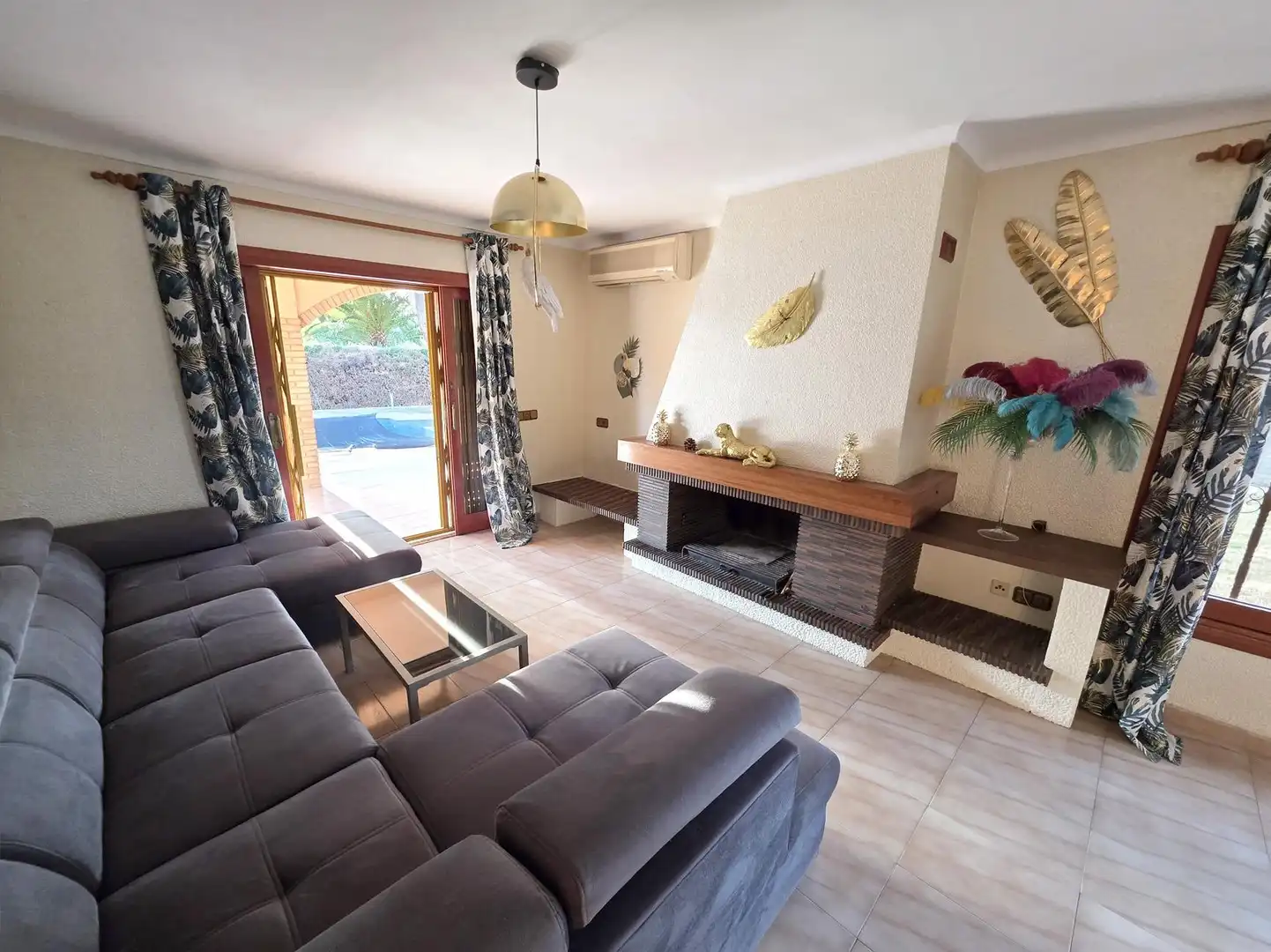 Sala de estar de Casa o chalet de alquiler en Benicasim / Benicàssim con Aire acondicionado, Jardín privado y Trastero