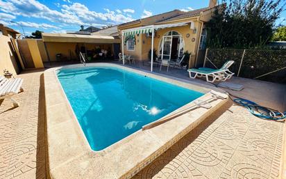 Swimming pool of House or chalet for sale in Torrevieja  with Air Conditioner, Heating and Private garden