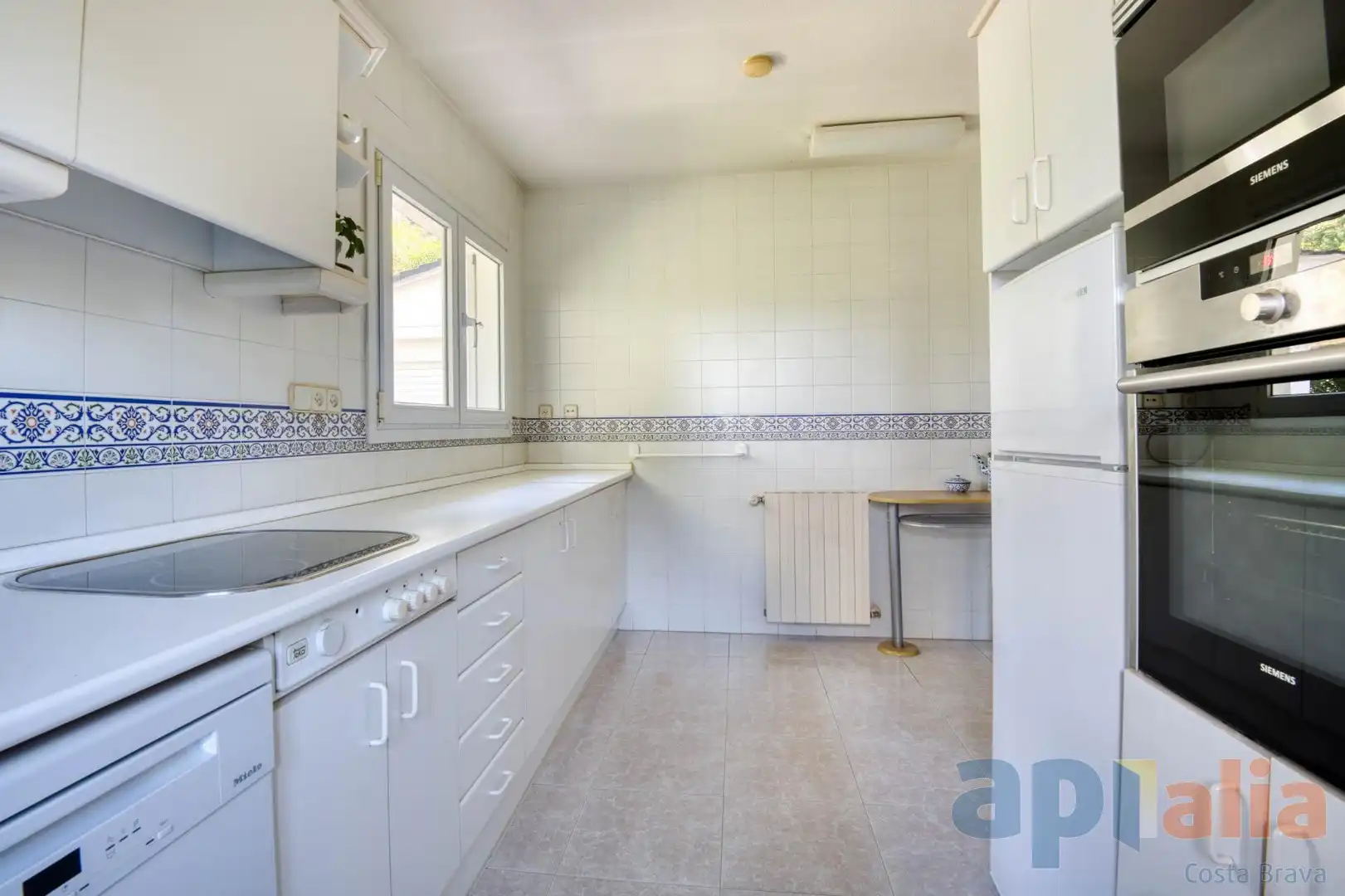 Cuina de Casa o xalet en venda en Santa Cristina d'Aro amb Calefacció, Jardí privat i Terrassa