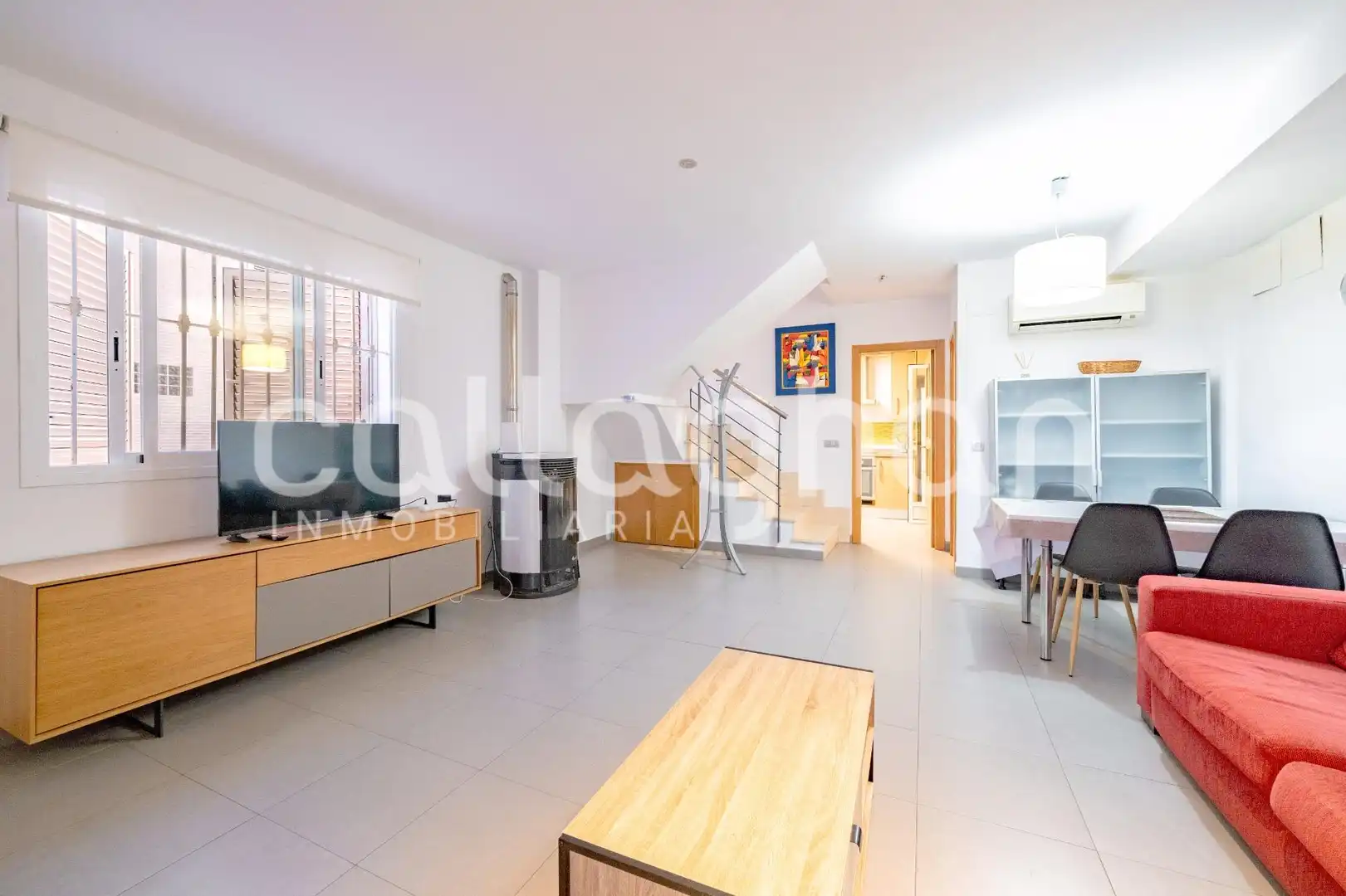 Sala d'estar de Casa adosada en venda en Moncofa amb Aire condicionat, Terrassa i Moblat