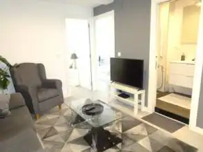 Sala de estar de Piso de alquiler en Gijón  con Calefacción, Parquet y Amueblado