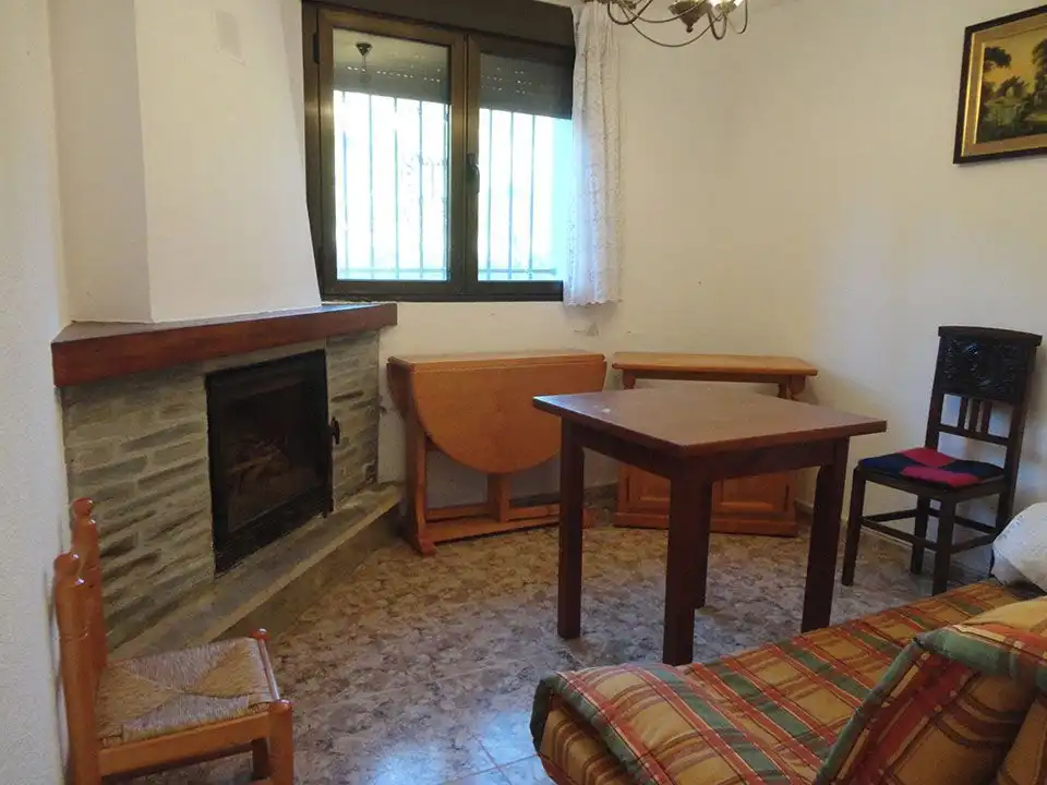 Sala de estar de Casa adosada en venta en Riocavado de la Sierra