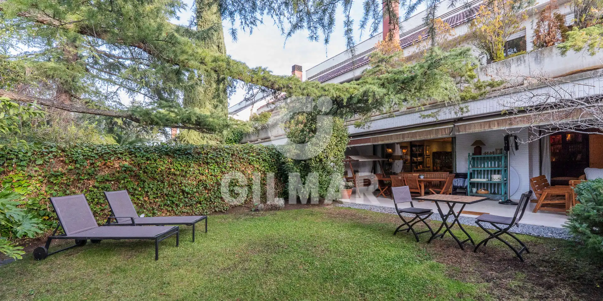 Garten von Einfamilien-Reihenhaus zum Verkauf in La Moraleja mit Klimaanlage, Heizung und Privatgarten