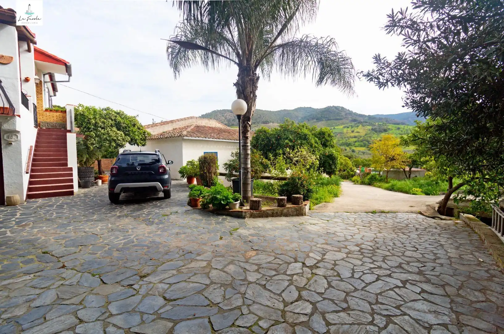 Vista exterior de Casa o xalet en venda en Carratraca amb Aire condicionat, Jardí privat i Terrassa