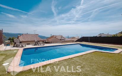 Swimming pool of House or chalet for sale in Bigues i Riells  with Air Conditioner, Heating and Private garden