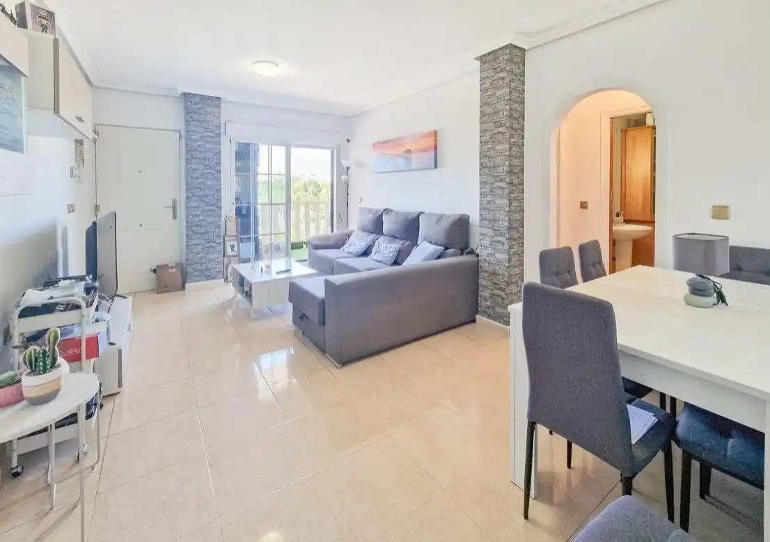 Sala d'estar de Apartament en venda en Orihuela amb Aire condicionat, Jardí privat i Piscina