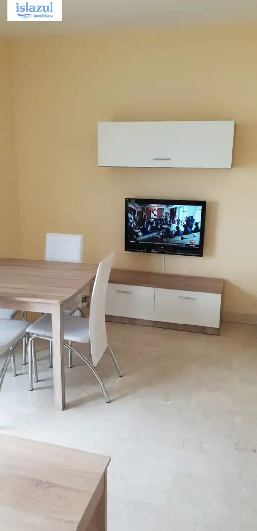 Sala de estar de Apartamento de alquiler en Isla Cristina con Aire acondicionado, Jardín privado y Terraza