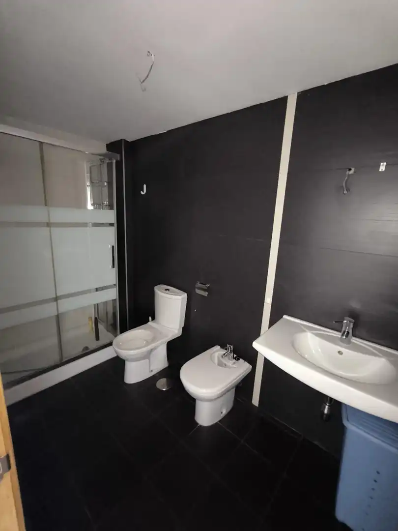 Bathroom of Flat for sale in Llanes  with Heating, Private garden and Parquet flooring