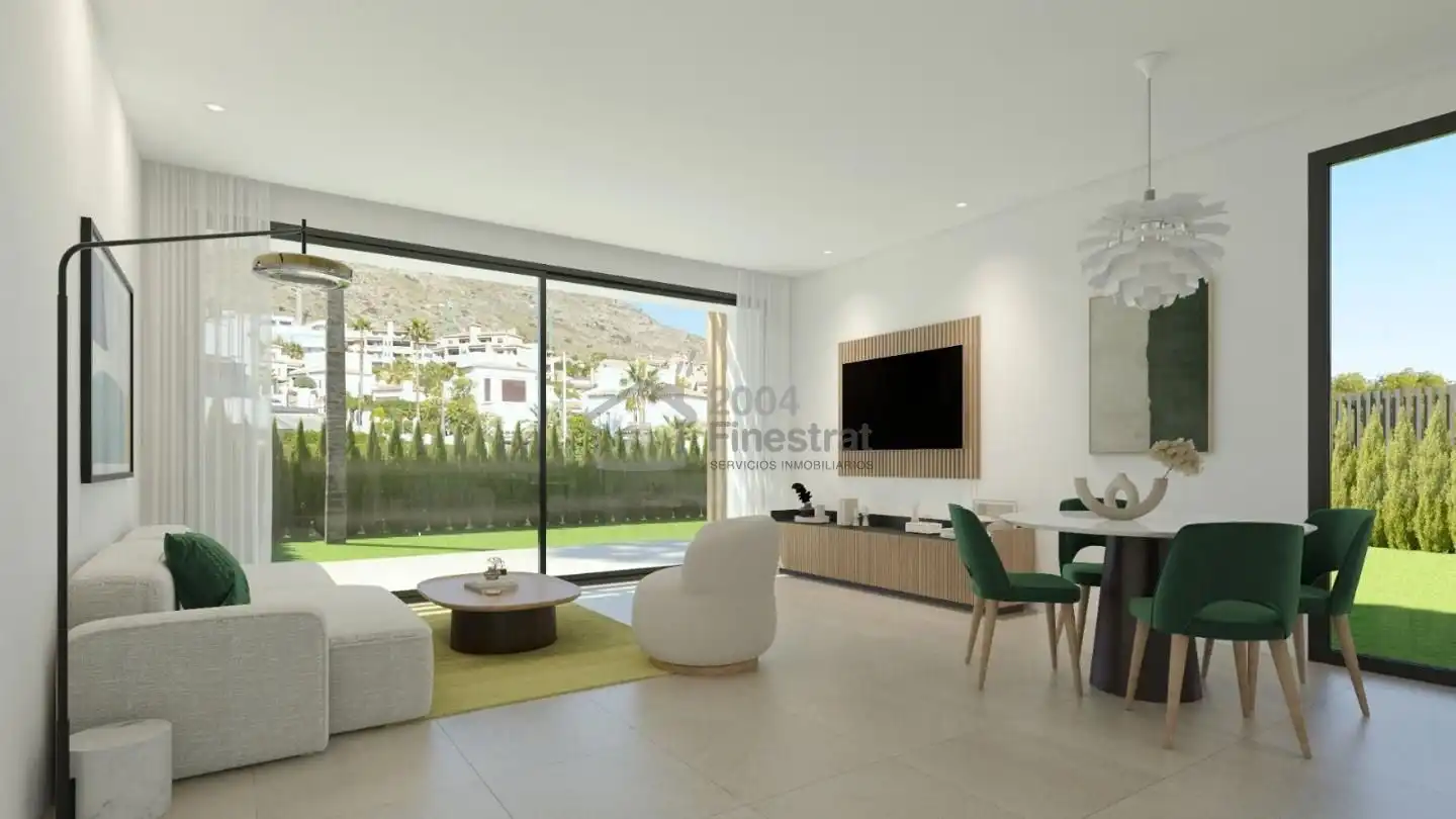 Sala d'estar de Casa adosada en venda en Finestrat amb Jardí privat, Terrassa i Piscina comunitària