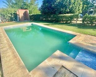 Swimming pool of House or chalet for sale in Badajoz Capital  with Air Conditioner, Heating and Private garden