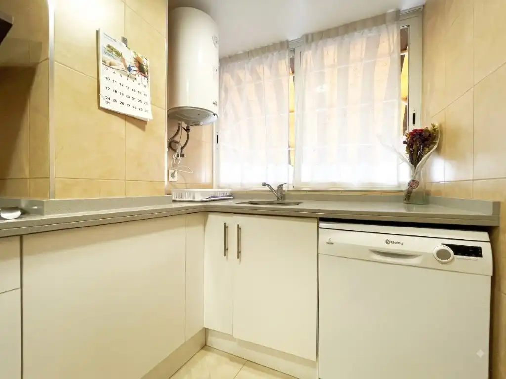 Kitchen of Flat for sale in Benicasim / Benicàssim  with Air Conditioner, Oven and Washing machine
