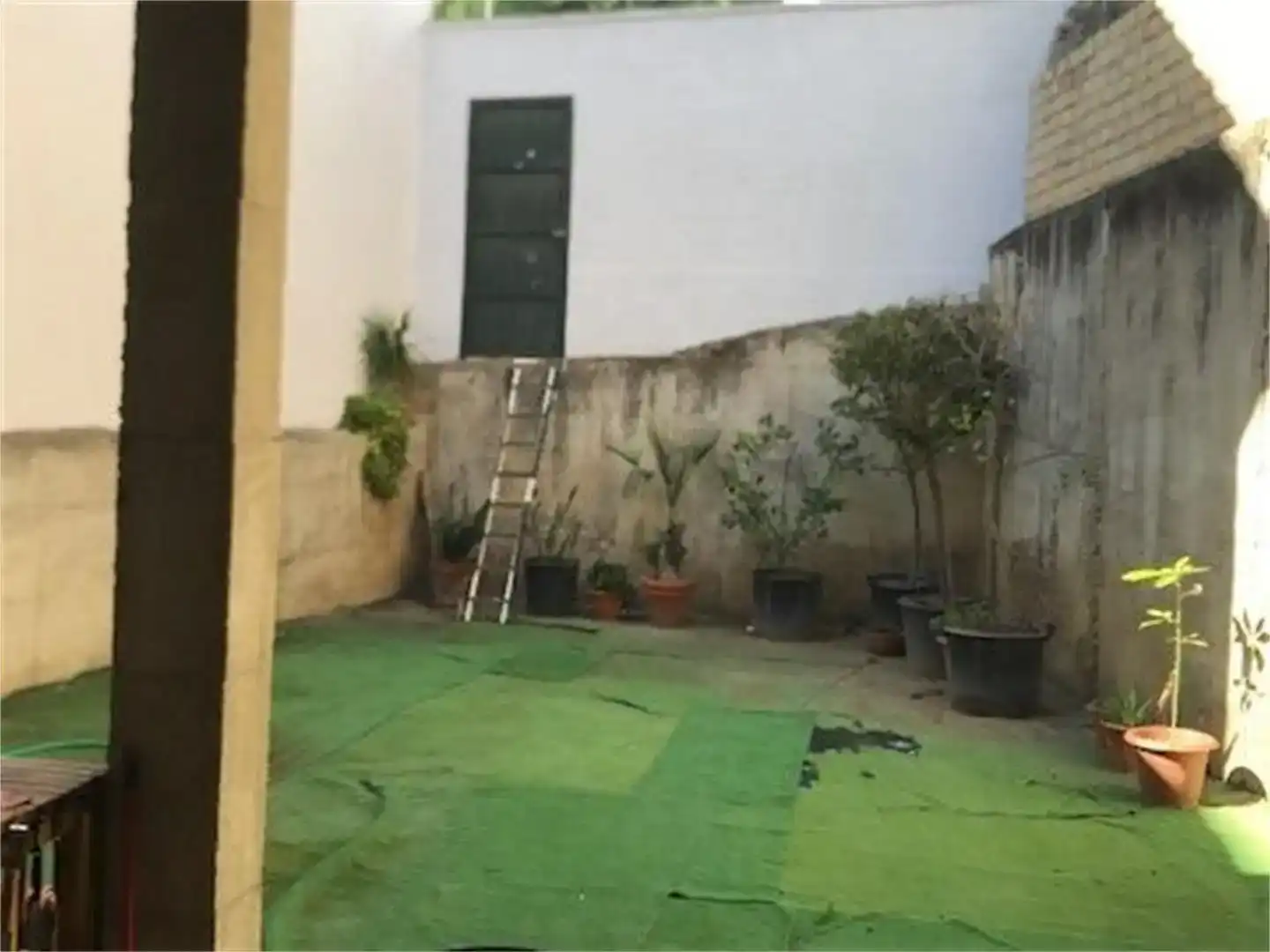 Jardí de Casa adosada en venda en Gelves amb Balcó