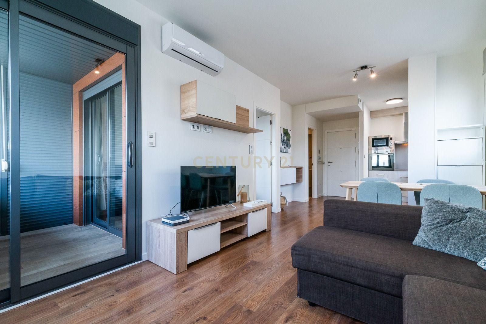 Wohnzimmer von Wohnung zum Verkauf in  Granada Capital mit Klimaanlage, Privatgarten und Ofen