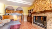 Sala d'estar de Casa adosada en venda en Motril amb Aire condicionat i Terrassa
