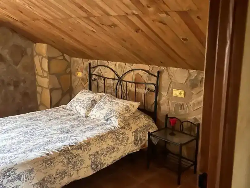 Dormitori de Casa o xalet en venda en Huéscar amb Jardí privat, Piscina i Moblat