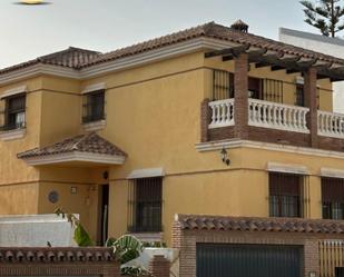 Exterior view of Single-family semi-detached for sale in Málaga Capital  with Air Conditioner, Heating and Terrace