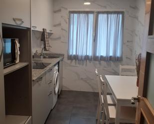 Kitchen of Flat to rent in Gijón   with Heating, Terrace and Storage room