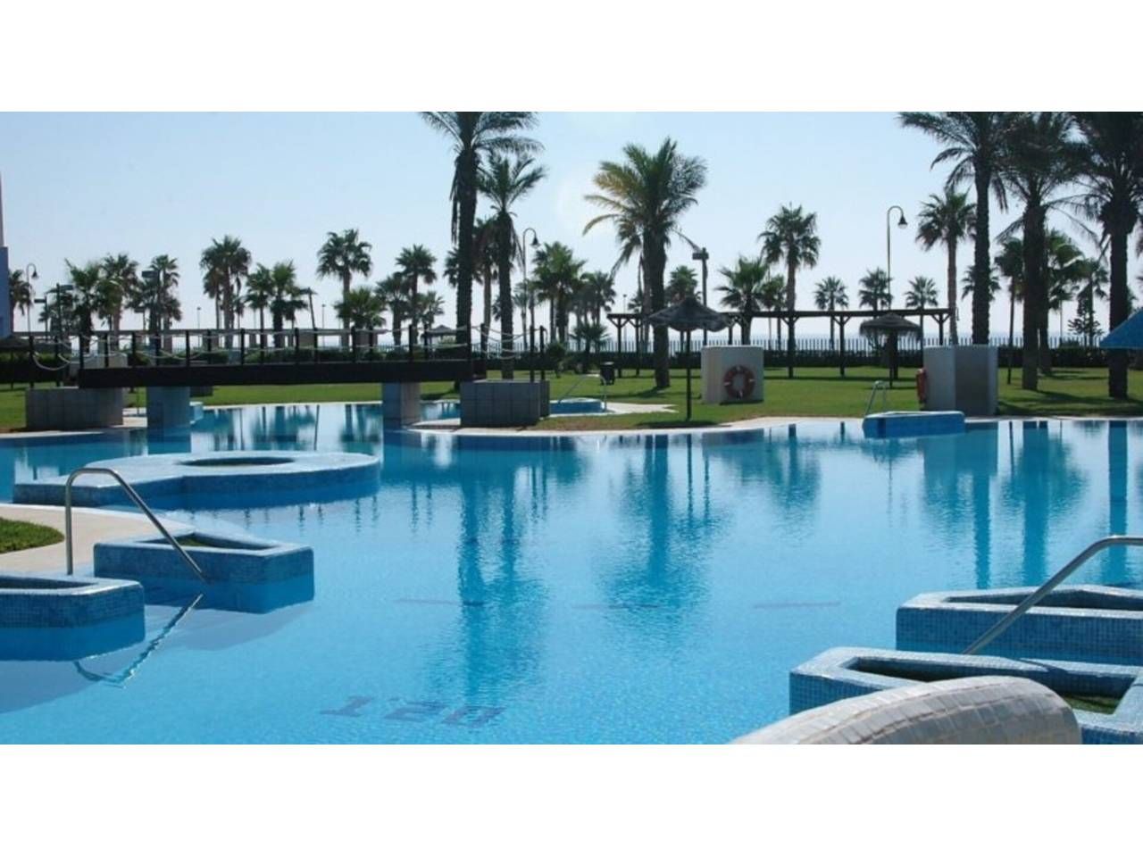 Swimming pool of Flat for sale in Roquetas de Mar  with Air Conditioner, Heating and Terrace