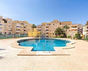 Swimming pool of Flat for sale in Roquetas de Mar  with Air Conditioner, Private garden and Terrace