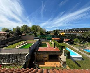 Jardí de Casa adosada en venda en Mos amb Calefacció, Jardí privat i Parquet