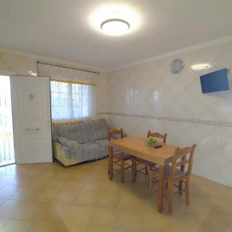 Sala d'estar de Casa o xalet en venda en Orihuela amb Aire condicionat, Jardí privat i Terrassa