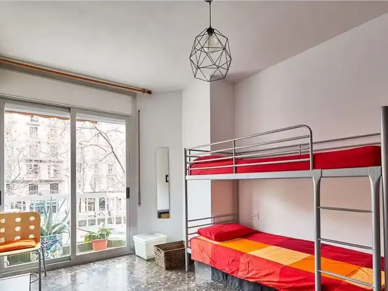 Schlafzimmer von Wohnung zur Miete in  Barcelona Capital mit Klimaanlage und Balkon
