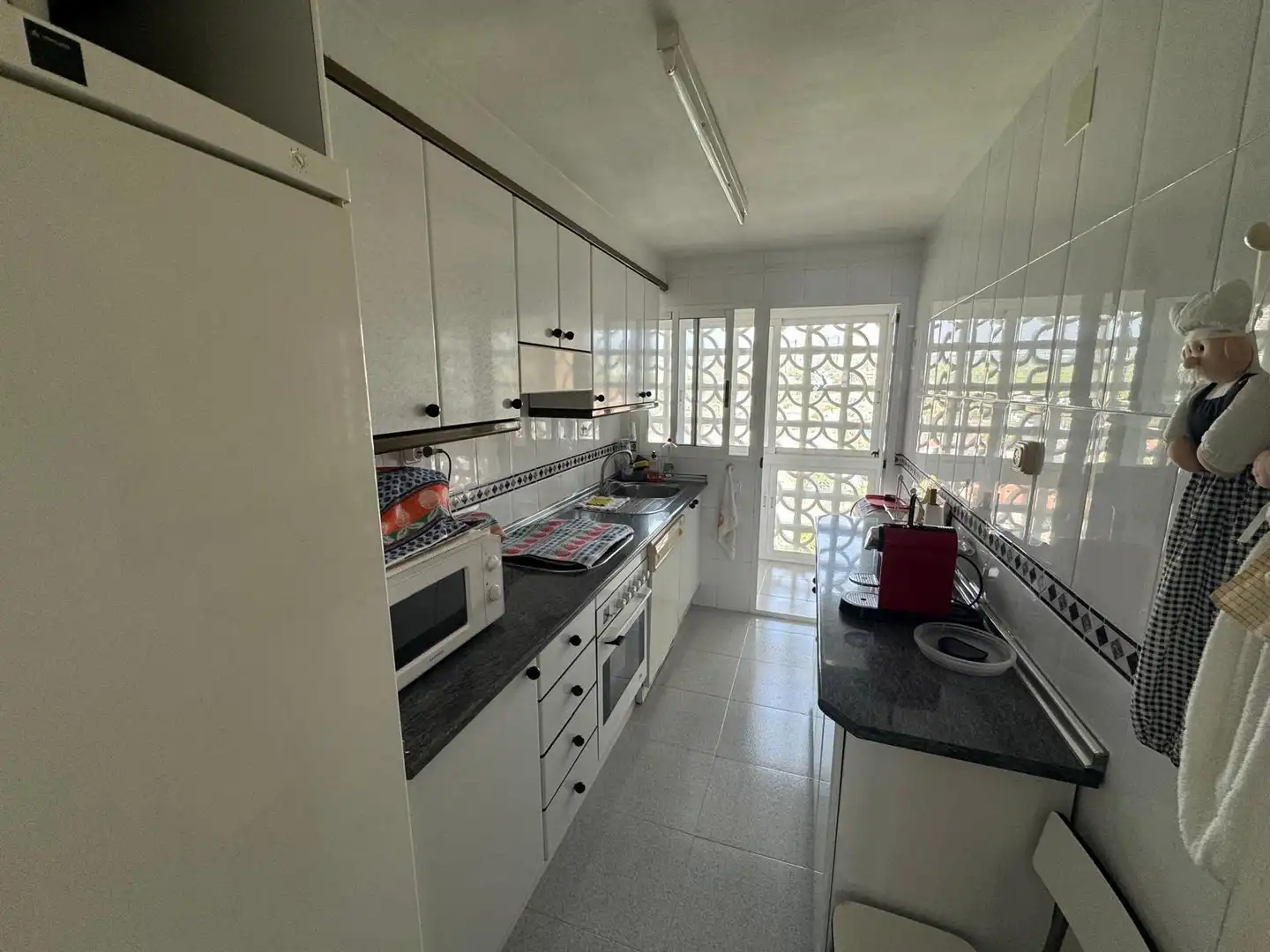 Cocina de Apartamento en venta en Benidorm con Aire acondicionado, Jardín privado y Amueblado