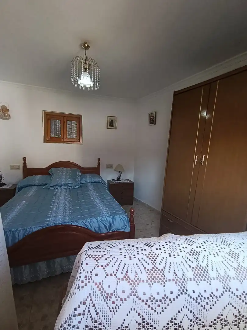 Dormitori de Casa adosada en venda en Iznájar amb Aire condicionat, Terrassa i Moblat
