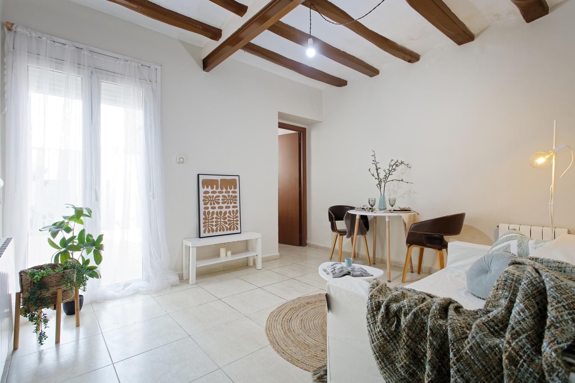 Sala d'estar de Casa adosada en venda en Terrassa amb Calefacció i Terrassa