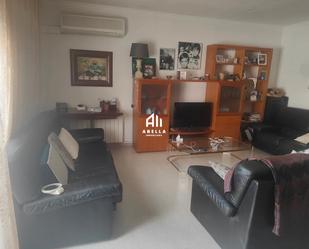 Living room of Single-family semi-detached for sale in Albatàrrec  with Air Conditioner, Terrace and Balcony