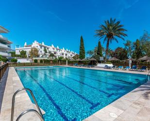 Swimming pool of Flat for sale in Marbella  with Air Conditioner, Terrace and Community pool