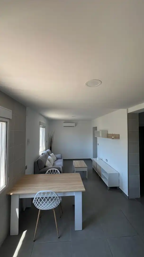 Sala d'estar de Pis de lloguer en Macharaviaya amb Aire condicionat i Moblat