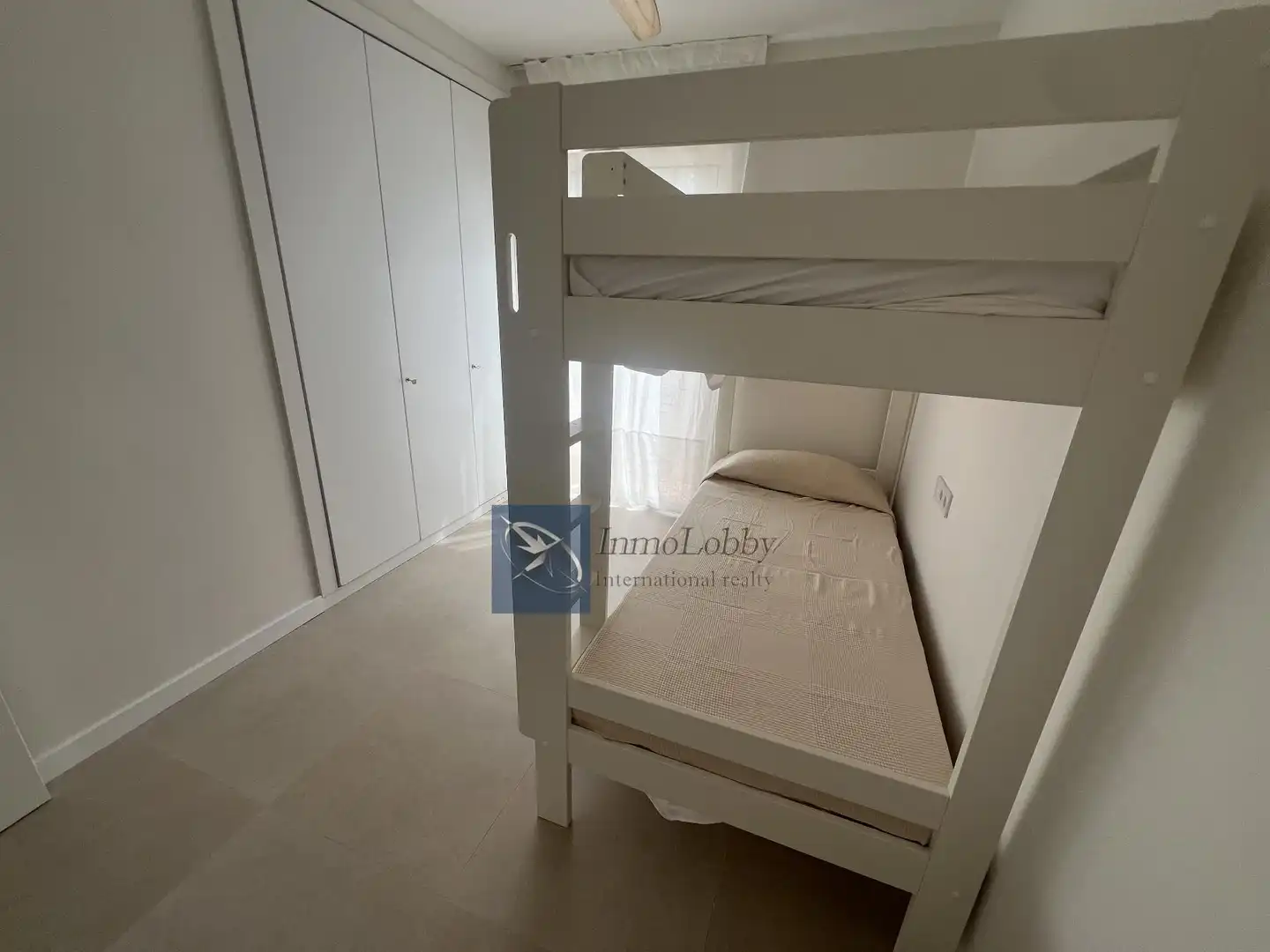 Dormitori de Apartament de lloguer en Castell d'Aro, Platja d'Aro i s'Agaró amb Aire condicionat, Terrassa i Piscina comunitària
