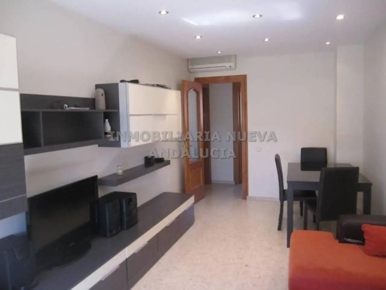 Sala d'estar de Pis de lloguer en Almería amb Aire condicionat i Moblat