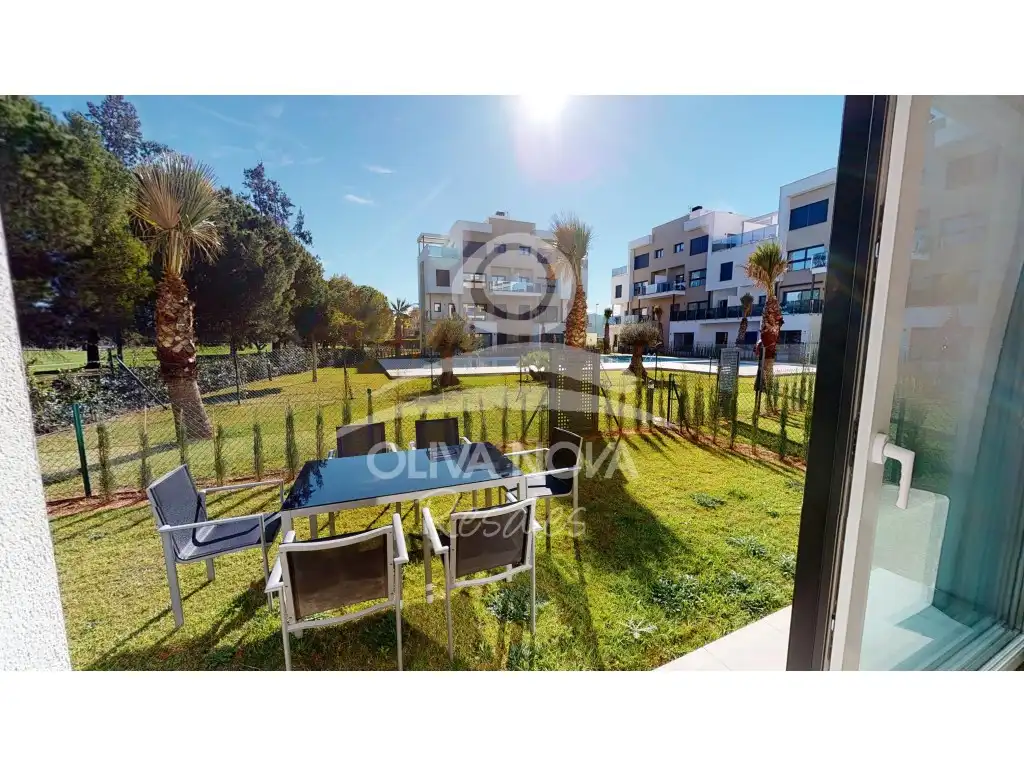 Vista exterior de Apartament en venda en Oliva amb Aire condicionat, Jardí privat i Piscina