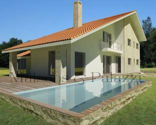 Swimming pool of House or chalet for sale in Nigrán