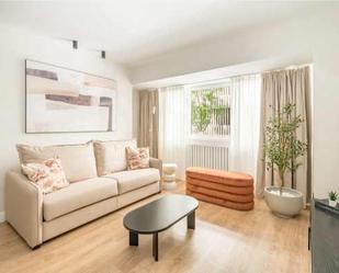 Living room of Flat for sale in  Madrid Capital  with Air Conditioner, Heating and Furnished